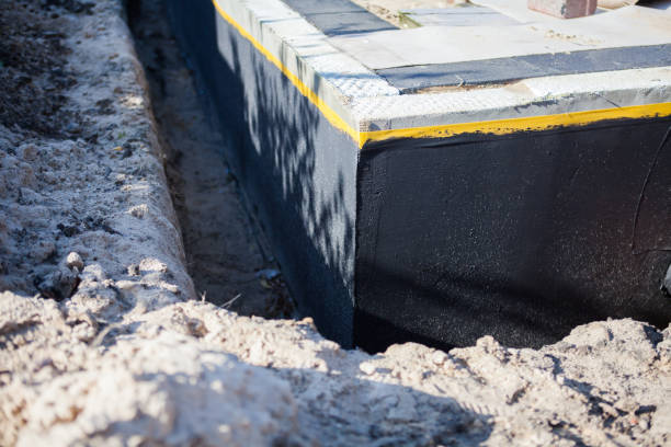 Professional Waterproofing technician working in Lexington, OH